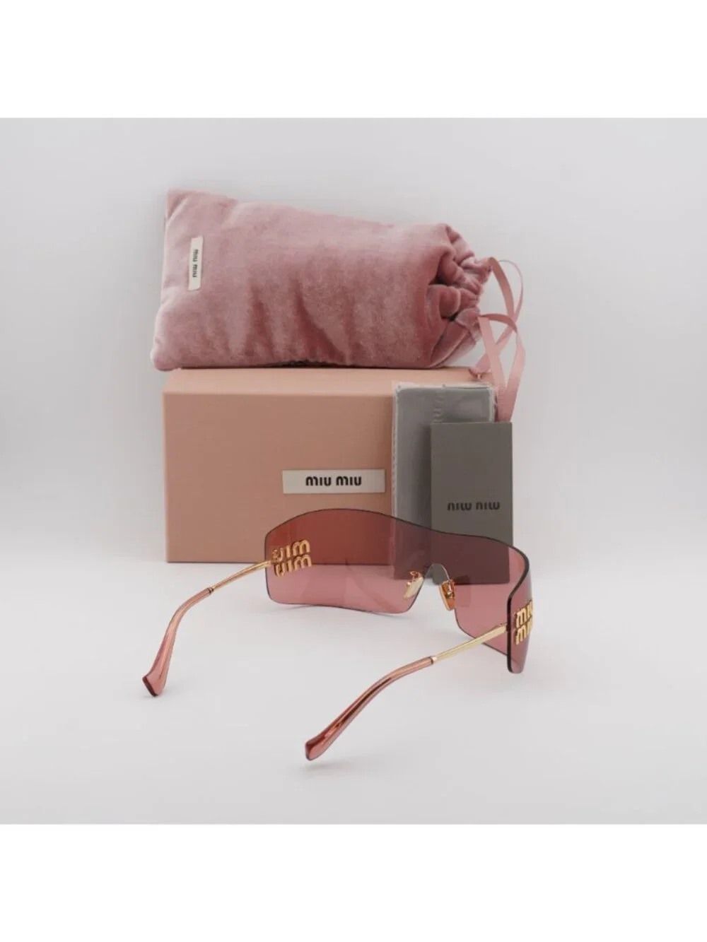 Miu Miu MUB53S 5AK20Y Rimless Shield Sunglasses – Gold / Red